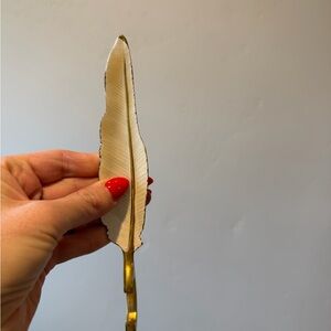 Anthropologie Gold and Cream Feather letter opener bottle opener